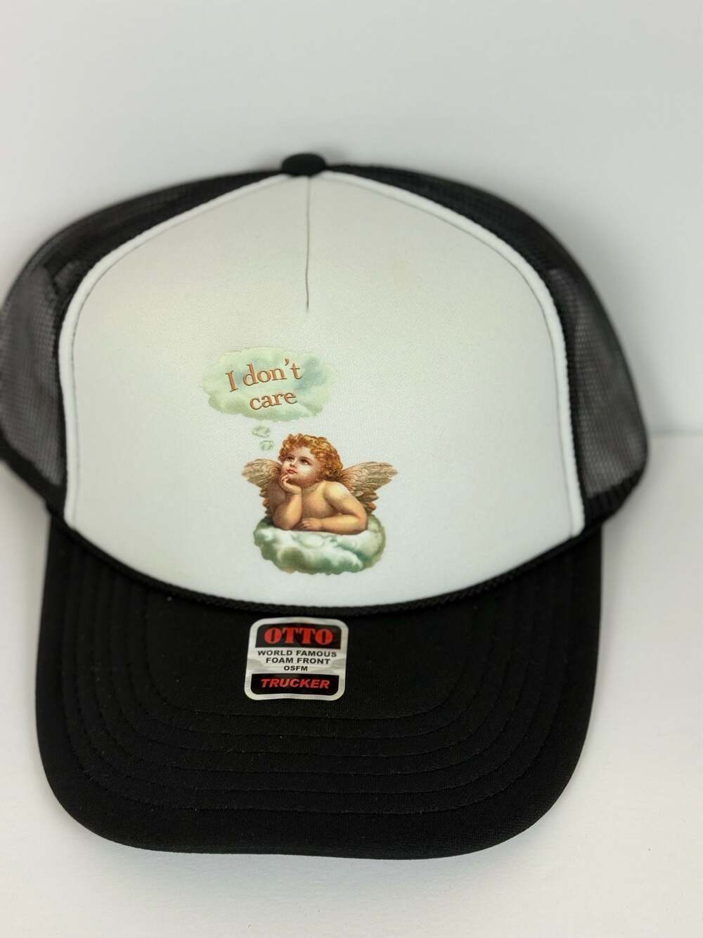 NWT Otto Cap Trucker Hat with Cherub 'I don't care' Graphic Print